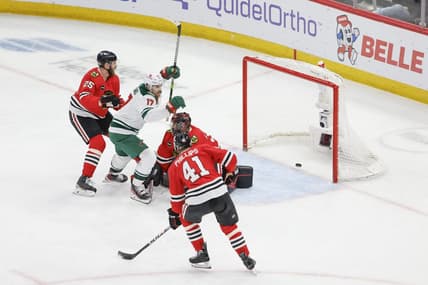 Feb 7, 2024; Chicago, Illinois, USA; Minnesota Wild left wing Marcus Foligno (17) celebrates after scoring against Chicago Blackhawks goaltender Petr Mrazek (34) during the third period at United Center. Mandatory Credit: Kamil Krzaczynski-USA TODAY Sports