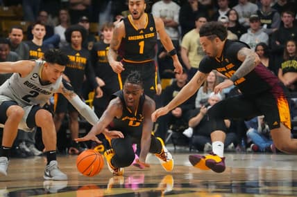Feb 8, 2024; Boulder, Colorado, USA; Arizona State Sun Devils guard Kamari Lands (0) and guard Jose Perez (12) and Colorado Buffaloes guard KJ Simpson (2) reach for a loose ball in the first half at the CU Events Center. Mandatory Credit: Ron Chenoy-USA TODAY Sports