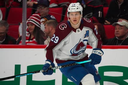 Feb 8, 2024; Raleigh, North Carolina, USA; Colorado Avalanche center Nathan MacKinnon (29) skates against the Carolina Hurricanes during the third period at PNC Arena. Mandatory Credit: James Guillory-USA TODAY Sports