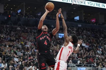 Feb 9, 2024; Toronto, Ontario, CAN; Toronto Raptors forward Scottie Barnes (4) shoots for a basket against Houston Rockets forward Amen Thompson (1) during the first half at Scotiabank Arena. Mandatory Credit: John E. Sokolowski-USA TODAY Sports