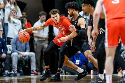 Michigan State's Malik Hall, right, guards Illinois' Coleman Hawkins during the second half on Saturday, Feb. 10, 2024, at the Breslin Center in East Lansing.