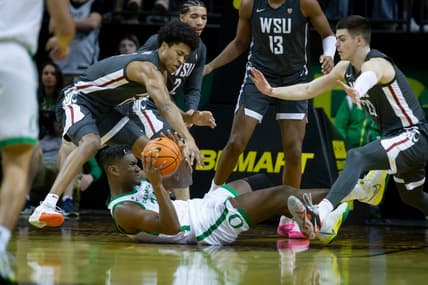 Oregon center Mahamadou Diawara looks to pass as the Oregon Ducks host the Washington State Cougars Saturday Feb. 10, 2024 at Matthew Knight Arena in Eugene, Ore.
