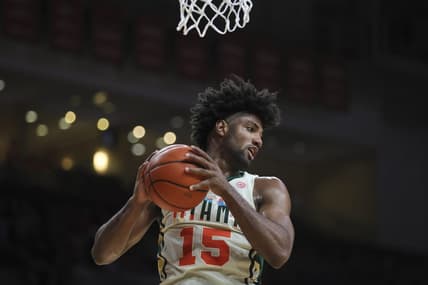 Feb 10, 2024; Coral Gables, Florida, USA; Miami Hurricanes forward Norchad Omier (15) grabs a rebound against the North Carolina Tar Heels during the first half at Watsco Center. Mandatory Credit: Sam Navarro-USA TODAY Sports