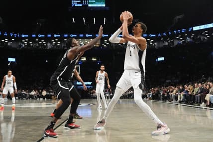 Feb 10, 2024; Brooklyn, New York, USA; San Antonio Spurs center Victor Wembanyama (1) shoots a jump shot against the Brooklyn Nets  during the first quarter at Barclays Center. Mandatory Credit: Gregory Fisher-USA TODAY Sports