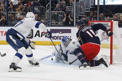 Feb 10, 2024; Columbus, Ohio, USA; Tampa Bay Lightning goalie Andrei Vasilevskiy (88) makes a save as Columbus Blue Jackets left wing Dmitri Voronkov (10) looks for a rebound during the second period at Nationwide Arena. Mandatory Credit: Russell LaBounty-USA TODAY Sports