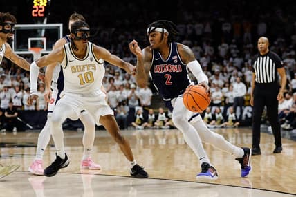 Feb 10, 2024; Boulder, Colorado, USA; Arizona Wildcats guard Caleb Love (2) drives to the basket against Colorado Buffaloes forward Cody Williams (10) in the first half at CU Events Center. Mandatory Credit: Isaiah J. Downing-USA TODAY Sports