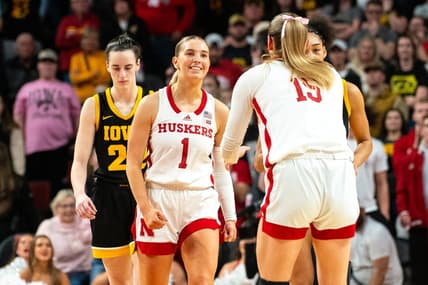 Feb 11, 2024; Lincoln, Nebraska, USA; Nebraska Cornhuskers guard Jaz Shelley (1) celebrates after making a three point shot against Iowa Hawkeyes guard Caitlin Clark (22) during the fourth quarter at Pinnacle Bank Arena. Mandatory Credit: Dylan Widger-USA TODAY Sports
