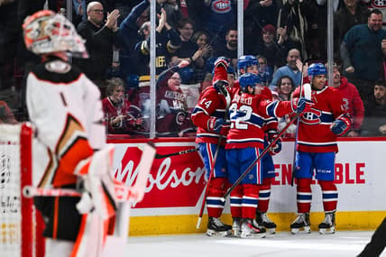 Feb 13, 2024; Montreal, Quebec, CAN; Montreal Canadiens center Nick Suzuki (14) celebrates his first goal of the game against the Anaheim Ducks with his teammates during the second period at Bell Centre. Mandatory Credit: David Kirouac-USA TODAY Sports