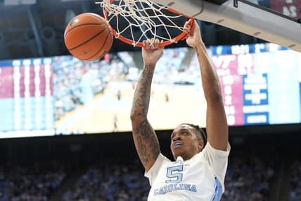 Feb 17, 2024; Chapel Hill, North Carolina, USA; North Carolina Tar Heels forward Armando Bacot (5) scores in the second half at Dean E. Smith Center. Mandatory Credit: Bob Donnan-USA TODAY Sports