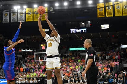 Feb 17, 2024; Providence, Rhode Island, USA; Providence Friars forward Rich Barron (10)  shoots against the DePaul Blue Demons during the first half at Amica Mutual Pavilion. Mandatory Credit: Eric Canha-USA TODAY Sports