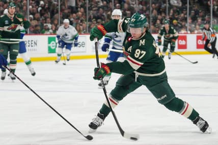 Feb 19, 2024; Saint Paul, Minnesota, USA; Minnesota Wild left wing Kirill Kaprizov (97) shoots against the Vancouver Canucks in the second period at Xcel Energy Center. Mandatory Credit: Matt Blewett-USA TODAY Sports