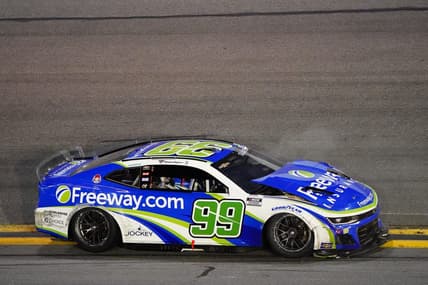 Feb 19, 2024; Daytona Beach, Florida, USA; NASCAR Cup Series driver Daniel Suarez (99) wrecks during the Daytona 500 at Daytona International Speedway. Mandatory Credit: John David Mercer-USA TODAY Sports