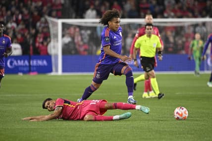 Feb 20, 2024; St. Louis, MO, USA; Houston Dynamo midfielder Adalberto Carrasquilla (20) dribbles past St. Louis City defender Anthony Markanich (13) during the first half of the CONCACAF Champions Cup-Round One at CITYPARK. Mandatory Credit: Joe Puetz-USA TODAY Sports