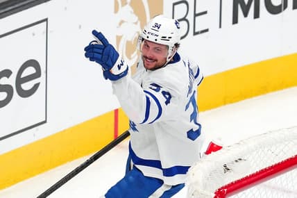 Feb 22, 2024; Las Vegas, Nevada, USA; Toronto Maple Leafs center Auston Matthews (34) celebrates after scoring a goal against the Vegas Golden Knights during the third period at T-Mobile Arena. Mandatory Credit: Stephen R. Sylvanie-USA TODAY Sports