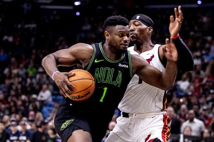 Feb 23, 2024; New Orleans, Louisiana, USA;  New Orleans Pelicans forward Zion Williamson (1) drives to the basket against Miami Heat center Bam Adebayo (13) during the second half at Smoothie King Center. Mandatory Credit: Stephen Lew-USA TODAY Sports
