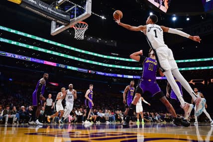 Feb 23, 2024; Los Angeles, California, USA; San Antonio Spurs center Victor Wembanyama (1) shoots against Los Angeles Lakers center Jaxson Hayes (11) during the second half at Crypto.com Arena. Mandatory Credit: Gary A. Vasquez-USA TODAY Sports