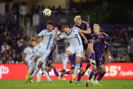 Feb 24, 2024; Orlando, Florida, USA; CF Montreal midfielder Dominic Iankov (8) CF Montreal midfielder Samuel Piette (6) battle Orlando City defender Robin Jansson (6) for the ball in the first half at Inter&Co Stadium. Mandatory Credit: Morgan Tencza-USA TODAY Sports