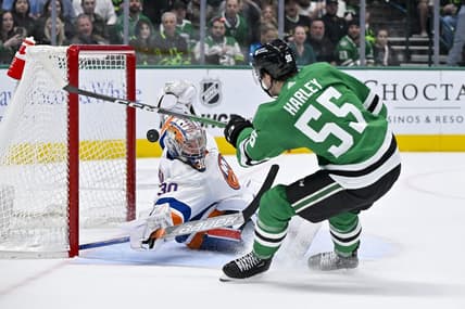 Feb 26, 2024; Dallas, Texas, USA; New York Islanders goaltender Ilya Sorokin (30) stops a breakaway shot by Dallas Stars defenseman Thomas Harley (55) during the second period at the American Airlines Center. Mandatory Credit: Jerome Miron-USA TODAY Sports