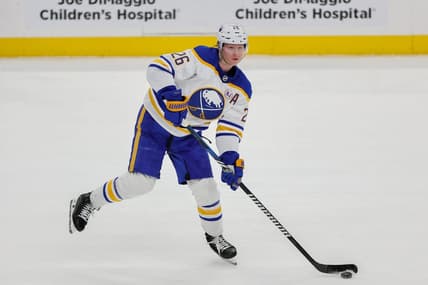 Feb 27, 2024; Sunrise, Florida, USA; Buffalo Sabres defenseman Rasmus Dahlin (26) moves the puck against the Florida Panthers during the first period at Amerant Bank Arena. Mandatory Credit: Sam Navarro-USA TODAY Sports