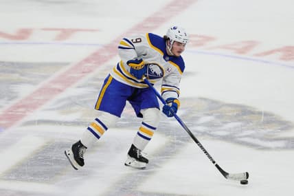 Feb 27, 2024; Sunrise, Florida, USA; Buffalo Sabres left wing Zach Benson (9) moves the puck against the Florida Panthers during the third period at Amerant Bank Arena. Mandatory Credit: Sam Navarro-USA TODAY Sports