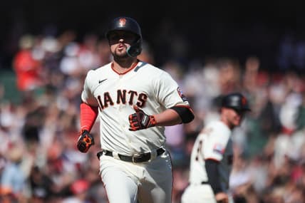 Sep 13, 2023; San Francisco, California, USA; San Francisco Giants third baseman J.D. Davis (7) reacts after hitting a three run home run during the eighth inning against the Cleveland Guardians at Oracle Park. Mandatory Credit: Sergio Estrada-USA TODAY Sports