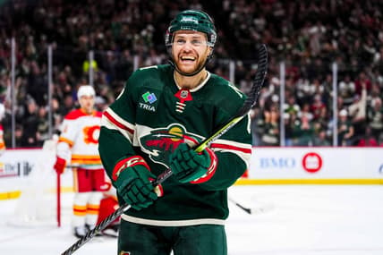 Jan 2, 2024; Saint Paul, Minnesota, USA; Minnesota Wild defenseman Dakota Mermis (6) celebrates a goal scored by left wing Pat Maroon (not pictured) during the second period against the Calgary Flames at Xcel Energy Center. Mandatory Credit: Brace Hemmelgarn-USA TODAY Sports