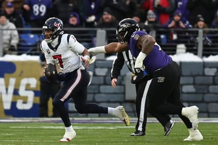 Jan 20, 2024; Baltimore, MD, USA; Houston Texans quarterback C.J. Stroud (7) runs the ball against Baltimore Ravens defensive tackle Justin Madubuike (92) during the first quarter of a 2024 AFC divisional round game at M&T Bank Stadium. Mandatory Credit: Tommy Gilligan-USA TODAY Sports