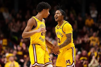 Feb 22, 2024; Minneapolis, Minnesota, USA; Minnesota Golden Gophers guard Elijah Hawkins (0) celebrates after guard Cam Christie's (24) three-point basket against the Ohio State Buckeyes during the second half at Williams Arena. Mandatory Credit: Matt Krohn-USA TODAY Sports