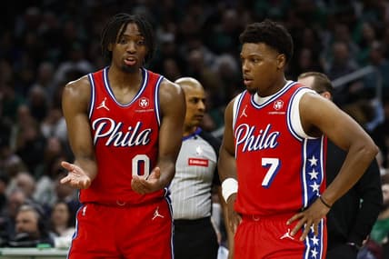 Feb 27, 2024; Boston, Massachusetts, USA; Philadelphia 76ers' Tyrese Maxey (0) talks with Kyle Lowry (7) during the second half of their loss to the Boston Celtics at TD Garden. Mandatory Credit: Winslow Townson-USA TODAY Sports