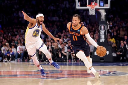 Feb 29, 2024; New York, New York, USA; New York Knicks guard Jalen Brunson (11) controls the ball against Golden State Warriors guard Moses Moody (4) during the first quarter at Madison Square Garden. Mandatory Credit: Brad Penner-USA TODAY Sports