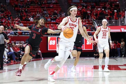 Feb 29, 2024; Salt Lake City, Utah, USA; Stanford Cardinal guard Kanaan Carlyle (3) knocks the ball away from Utah Utes center Branden Carlson (35) during the second half at Jon M. Huntsman Center. Mandatory Credit: Rob Gray-USA TODAY Sports