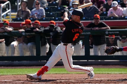 Mar 1, 2024; Scottsdale, Arizona, USA; San Francisco Giants left fielder Michael Conforto (8) bats against the Texas Rangers during the first inning at Scottsdale Stadium. Mandatory Credit: Joe Camporeale-USA TODAY Sports