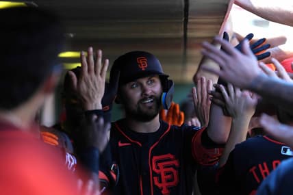 Mar 1, 2024; Scottsdale, Arizona, USA; San Francisco Giants first baseman J.D. Davis (7) celebrates with teammates after hitting a home run against the Texas Rangers during the second inning at Scottsdale Stadium. Mandatory Credit: Joe Camporeale-USA TODAY Sports
