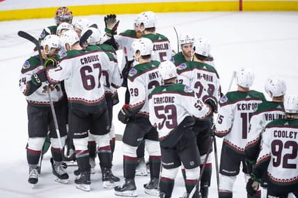 Mar 1, 2024; Ottawa, Ontario, CAN; The Arizona Coyotes celebrate their win against the Ottawa Senators at the Canadian Tire Centre. Mandatory Credit: Marc DesRosiers-USA TODAY Sports