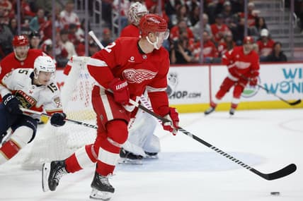 Mar 2, 2024; Detroit, Michigan, USA; Detroit Red Wings defenseman Olli Maatta (2) skates with the puck in the third period against the Florida Panthers at Little Caesars Arena. Mandatory Credit: Rick Osentoski-USA TODAY Sports