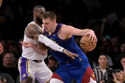 Mar 2, 2024; Los Angeles, California, USA;  Los Angeles Lakers forward LeBron James (23) guards Denver Nuggets center Nikola Jokic (15) in the second half at Crypto.com Arena. Mandatory Credit: Jayne Kamin-Oncea-USA TODAY Sports