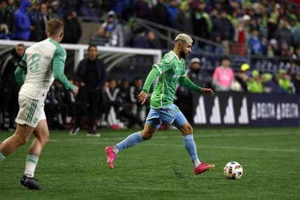 Mar 2, 2024; Seattle, Washington, USA; Seattle Sounders FC defender Alex Roldan (16) controls the ball against Austin FC midfielder Alex Ring (8) during the second half at Lumen Field. Mandatory Credit: Joe Nicholson-USA TODAY Sports