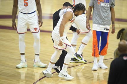 Mar 3, 2024; Cleveland, Ohio, USA; New York Knicks guard Jalen Brunson (11) limps off the court in the first quarter against the Cleveland Cavaliers at Rocket Mortgage FieldHouse. Mandatory Credit: David Richard-USA TODAY Sports