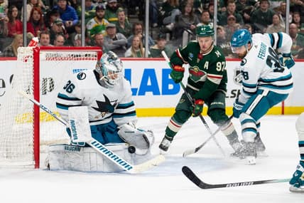 Mar 3, 2024; Saint Paul, Minnesota, USA; San Jose Sharks goaltender Kaapo Kahkonen (36) makes a save as Minnesota Wild left wing Kirill Kaprizov (97) awaits a rebound in the second period at Xcel Energy Center. Mandatory Credit: Matt Blewett-USA TODAY Sports