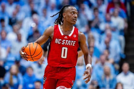 Mar 2, 2024; Chapel Hill, North Carolina, USA; North Carolina State Wolfpack guard DJ Horne (0) brings the ball up court against the North Carolina Tar Heels at Dean E. Smith Center. Mandatory Credit: Scott Kinser-USA TODAY Sports