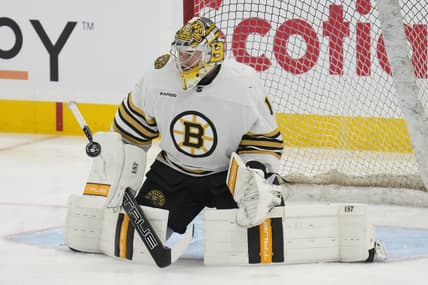 Mar 4, 2024; Toronto, Ontario, CAN; Boston Bruins goaltender Jeremy Swayman (1) makes a save during warm up before a game against the Toronto Maple Leafs at Scotiabank Arena. Mandatory Credit: John E. Sokolowski-USA TODAY Sports