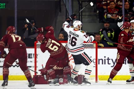 Mar 5, 2024; Tempe, Arizona, USA;  Chicago Blackhawks center Jason Dickinson (16) celebrates after scoring a goal during the second period of the game against the Arizona Coyotes at Mullett Arena. Mandatory Credit: Mark J. Rebilas-USA TODAY Sports