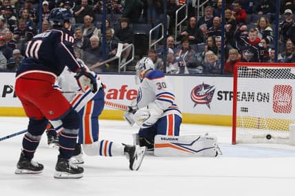 Mar 7, 2024; Columbus, Ohio, USA; the shot from Columbus Blue Jackets left wing Dmitri Voronkov (10) beats Edmonton Oilers goalie Calvin Pickard (30) for a goal during the first period at Nationwide Arena. Mandatory Credit: Russell LaBounty-USA TODAY Sports