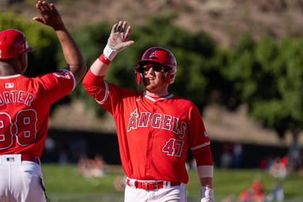 Mar 8, 2024; Tempe, Arizona, USA; Los Angeles Angels infielder Sam Brown (47) celebrates after hitting the go ahead run in the ninth to score outfielder Jordyn Adams (39) (not shown) in the ninth during a spring training game against the Colorado Rockies at Tempe Diablo Stadium. Mandatory Credit: Allan Henry-USA TODAY Sports