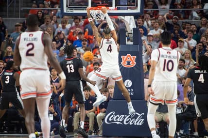 Auburn Tigers forward Johni Broome (4) dunks the ball as Auburn Tigers take on Georgia Bulldogs at Neville Arena in Auburn, Ala., on Saturday, March 9, 2024.