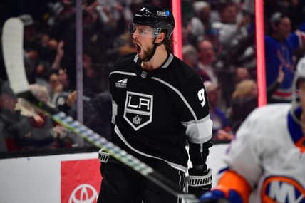 Mar 11, 2024; Los Angeles, California, USA;  Los Angeles Kings right wing Adrian Kempe (9) celebrates his goal scored against the against the New York Islanders during the second period at Crypto.com Arena. Mandatory Credit: Gary A. Vasquez-USA TODAY Sports