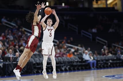 Mar 13, 2024; Washington, D.C., USA; Virginia Tech Hokies guard Sean Pedulla (3) shoots the ball as Florida State Seminoles guard Jalen Warley (1) defends in the first half at Capital One Arena. Mandatory Credit: Geoff Burke-USA TODAY Sports