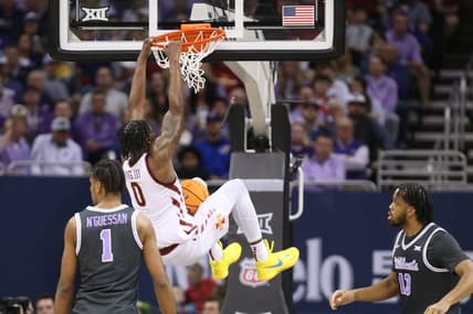 Iowa State senior forward Tre King (0) dunks over Kansas State in the first half of the quarterfinal round in the Big 12 Tournament inside the T-Mobile Center in Kansas City, Mo.