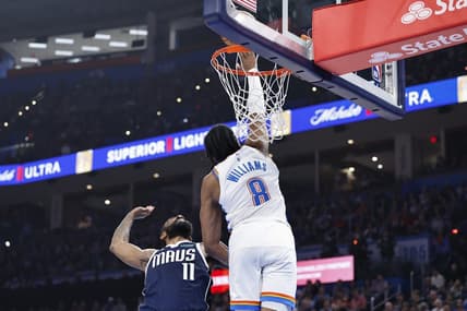 Mar 14, 2024; Oklahoma City, Oklahoma, USA; Oklahoma City Thunder forward Jalen Williams (8) blocks a shot by Dallas Mavericks guard Kyrie Irving (11) during the first half at Paycom Center. Mandatory Credit: Alonzo Adams-USA TODAY Sports