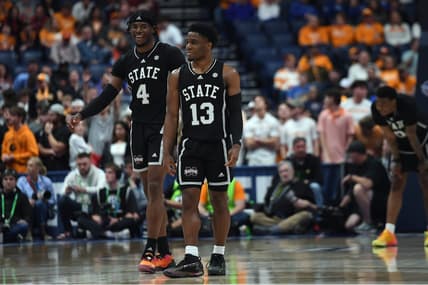 Mar 15, 2024; Nashville, TN, USA; Mississippi State Bulldogs forward Cameron Matthews (4) and guard Josh Hubbard (13) celebrate late in the second half of a win against the Tennessee Volunteers at Bridgestone Arena. Mandatory Credit: Christopher Hanewinckel-USA TODAY Sports